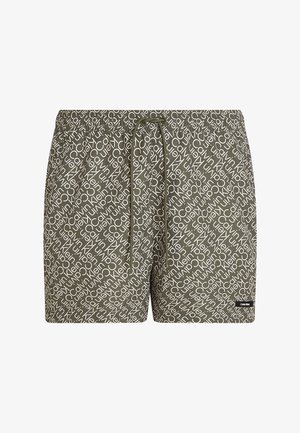 Olivekowe kąpielówki z białym nadrukiem logo na całej powierzchni, elastycznym pasem i sznurkiem. Gładka faktura materiału z bocznymi detalami.