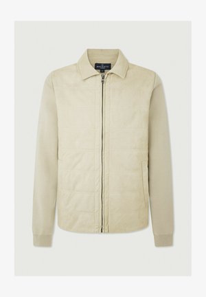 Beige jacka med dragkedja framtill, kviltad design på kroppen, tröjärmar och krage. Har sidofickor för förvaring.