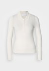 - Sweter
