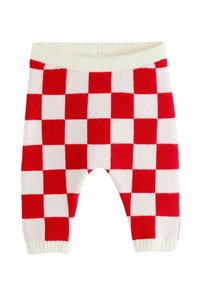 Červeno-bílé kostkované pletené kalhoty s žebrovaným pasem a manžetami. Měkká textura s volným střihem pro pohodlí.