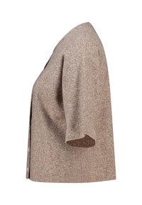 Beige lyhythelmainen neulejakku nappien kanssa, esitetty sivulta valkoista taustaa vasten.