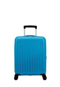 Valigia blu compatta con scanalature verticali, manico retrattile nero e quattro ruote nere per una facile mobilità. Chiusura a zip laterale.