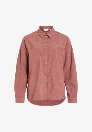 Dolga roza srajca iz festonskega kordusa z ovratnikom, sprednjim zapenjanjem na gumbe, dvema žepoma na prsih in zaobljenim spodnjim robom.