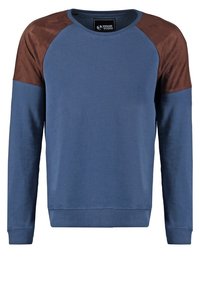 Felpa blu con maniche raglan in suede marrone, colletto rotondo e polsini e orlo a costine. Texture morbida, vestibilità casual e minimal branding.