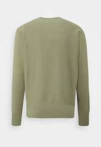 Olive szara bluza z długim rękawem, ściągacze przy mankietach i u dołu. Wykonana z miękkiej bawełny, okrągły dekolt, gładka strukturą.