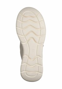 Rubber outsole in off-white with a wave pattern, featuring textured grooves and raised sections for traction and flexibility.