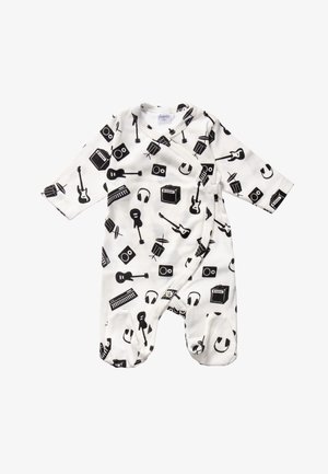 Hvid babybody med lange ærmer med sorte print af musikinstrumenter, herunder guitarer, trommer, hovedtelefoner, keyboard og forstærkere.
