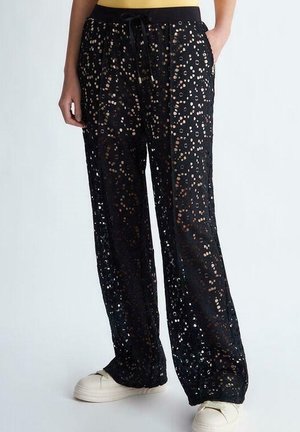 Spodnie materiałowe