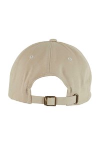 Casquette de baseball beige avec un visière courbée, une sangle ajustable à l'arrière et des trous de ventilation de chaque côté. Fabriquée en tissu texturé.