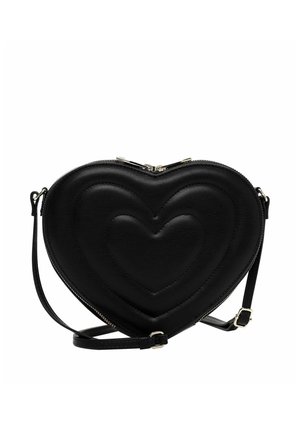 Black heart-shaped handbag with embossed heart pattern, silver zipper closure, and adjustable shoulder strap on white background.