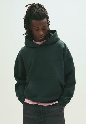 Kapuzenpullover - dark green