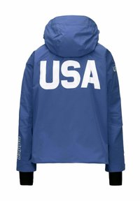 Giacca blu con cappuccio, caratterizzata da grande testo bianco "USA" sulla schiena e polsini neri. Realizzata in materiale liscio e impermeabile.