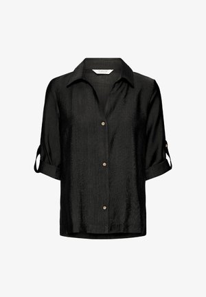 Must musta, lühikeste varrukatega särk, nööbiga esiosa, klassikalise krae ja ülespööratud varrukatega. Valmistatud tekstureeritud kangast, millel on mugav lõige.