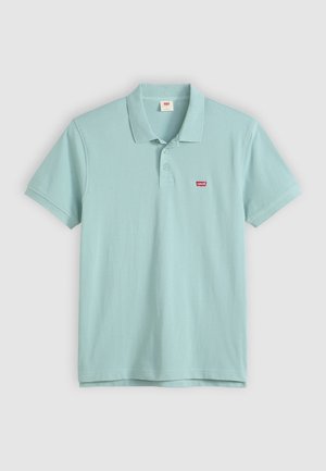 Lyseblå polo skjorte lavet af blødt bomuld, med krave, to-knaps lukning og et lille rødt Levi's logo på venstre bryst.