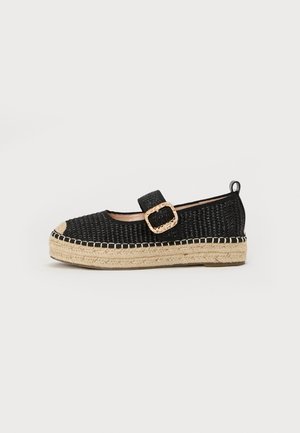 Zwarte geweven espadrille-schoen met een ronde neus, een decoratieve gesp en een jute touwzool. Heeft een contrastkleurige neuskap en stiksels.