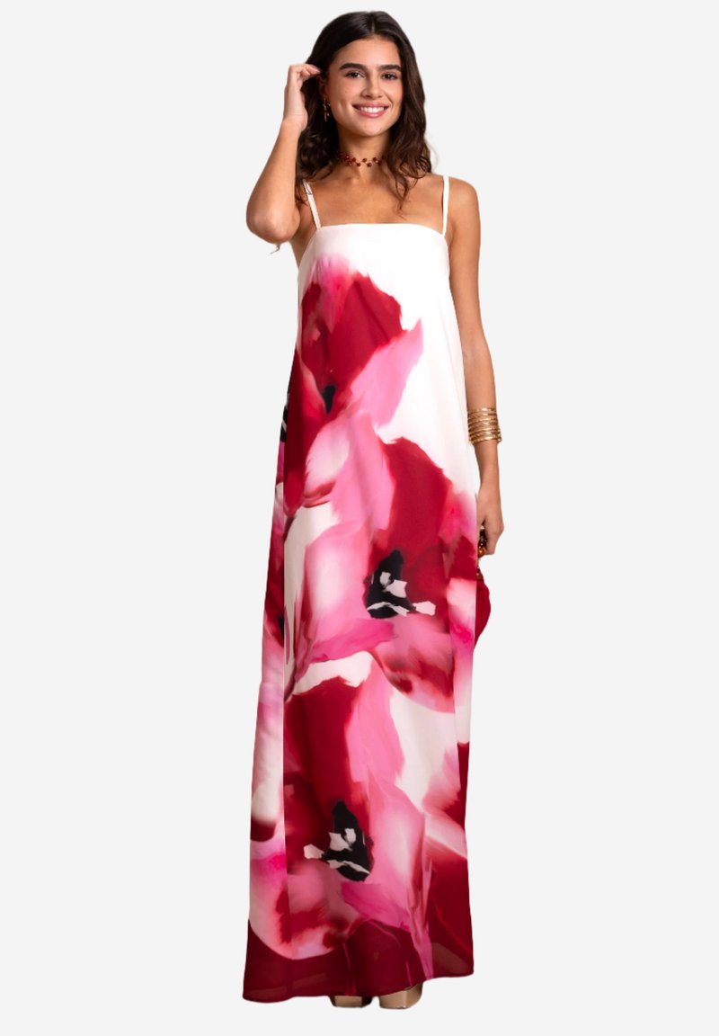 Maxikleid aus leichtem Stoff mit einem Blumenmuster in Pink- und Weißtönen, dünnen Trägern und einem lockeren, fließenden Design.