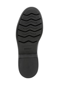 Suola di scarpa nera in gomma con un motivo a onde, scanalature per migliore aderenza, marchio in rilievo e finitura liscia e strutturata.