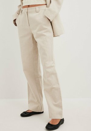 Beige tailored trousers made of lightweight fabric, featuring a straight leg, side pockets, and a flat front with belt loops.