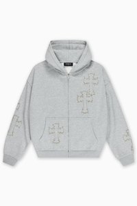 Γκρι φούτερ με φερμουάρ και κουκούλα με κορδόνι, με κεντήματα σε ανοιχτό χρυσό χρώμα σε σχέδια σταυρού. Με μπροστινή τσέπη και ριμπ μανσέτες. Υφή απαλού υφάσματος.