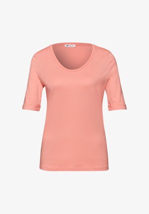 Miękki różowy krótki rękaw z mankietami i okrągłym dekoltem, prezentowany na białym tle.