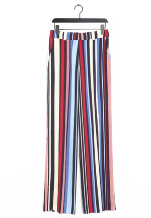 Pantalons larges à rayures comportant des rayures verticales en rouge, bleu, blanc, noir et rose ; fabriqués en tissu léger avec une taille sans couture.