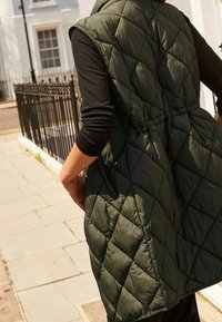 Next Chaleco - green