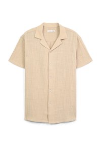Camicetta beige a maniche corte con bottoni realizzata in tessuto testurizzato, con colletto a scollatura a V, caratterizzata da cinque bottoni sul davanti.