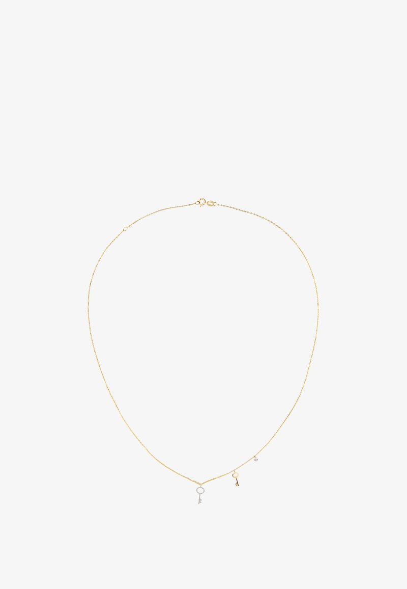 Guldkæde med to vedhæng: en lille sølv nøgle og en rund løkke. Delikat, tyndt design med en karabinlås.