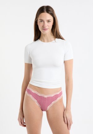White short-sleeve top paired with pink-striped panties featuring lace trim and a small bow at the center front. Smooth texture overall.