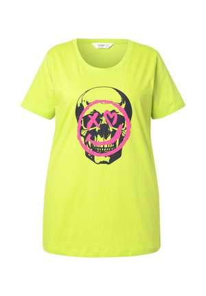 Neon groene katoenen t-shirt met een zwart schedelontwerp binnen een roze cirkel met X-ogen en een glimlachende mond. Korte mouwen en ronde hals.