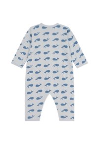 Lys grå barnejumpsuit med et gjentatt hvalmønster i blått. Lange ermer, myk stoff, og rund halslinning med åpninger for bena.