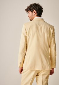 Next SLIM FIT MOTIONFLEX TWO BUTTON - Sako - yellow