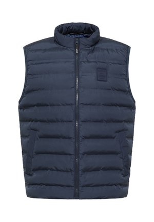 Marineblå polstret vest med høj krave, lynlås lukning, to sidelommer og et struktureret quiltet mønster. Har et mærke på brystet.