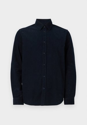 Temno modra srajca z dolgimi rokavi iz teksturirane tkanine, s sprednjim delom na gumbe, koničastim ovratnikom in manšeti na gumbe.