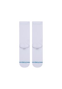 White athletic socks with ribbed texture, crew length, featuring a subtle blue accent at the cuffs and grey logo near the toe area.