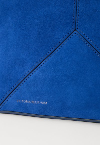 Victoria Beckham Soma ar siksnu pāri ķermenim - sapphire blue