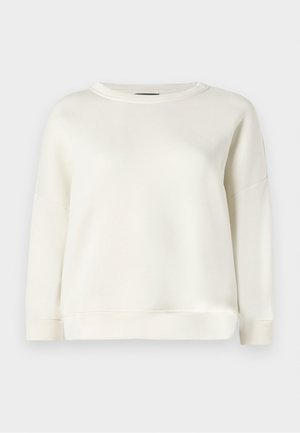 Sudadera blanca de manga larga hecha de algodón suave. Presenta un escote redondo, hombros caídos y un dobladillo acanalado. Textura suave con un diseño mínimo.