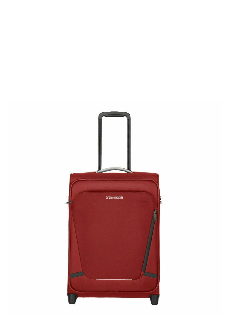 Red fabric suitcase with retractable handle, black accents, smooth texture, front zipper pocket, and four black rolling wheels.