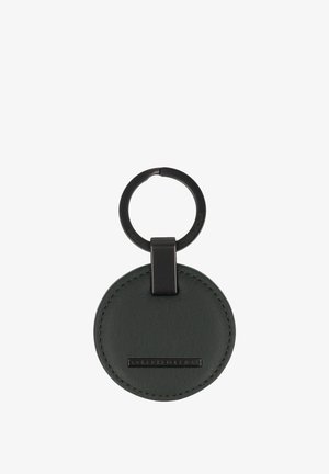 Llavero redondo de cuero negro con anilla metálica negra y placa con el logotipo "Porsche Design" en el centro frontal.