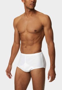 Boxer brevissimi bianchi in cotone con vestibilità aderente, dotati di una morbida cintura e cuciture minime per una texture liscia e comfort.