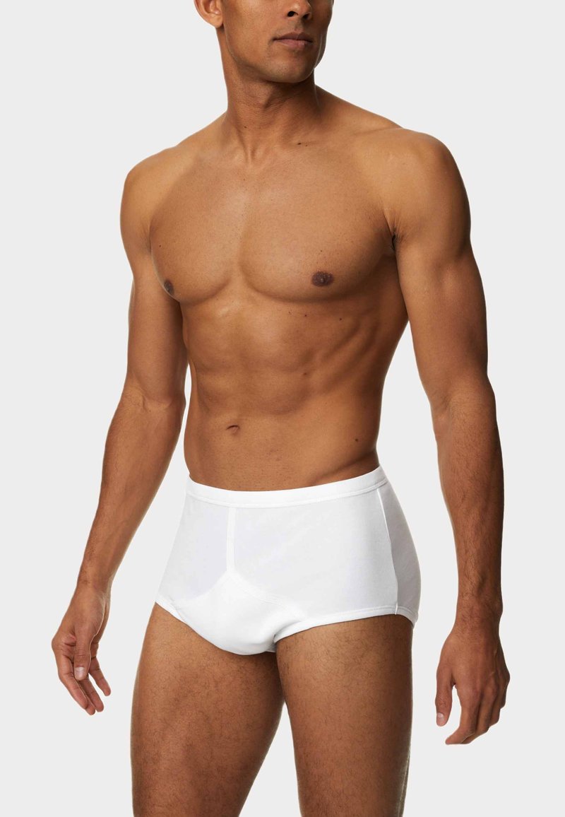 Boxer brevissimi bianchi in cotone con vestibilità aderente, dotati di una morbida cintura e cuciture minime per una texture liscia e comfort.
