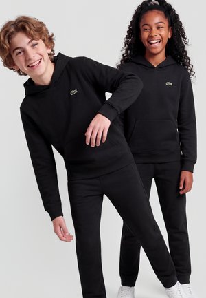 Lacoste, CORE PULLOVER HOODIE UNISEX  - Kapuzenpullover - noir