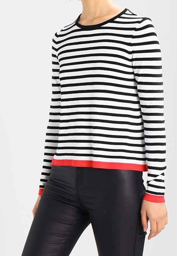 Zwart-wit gestreept shirt met lange mouwen en een rode rand. Ronde halslijn, relaxte pasvorm en een soepele stoftextuur.