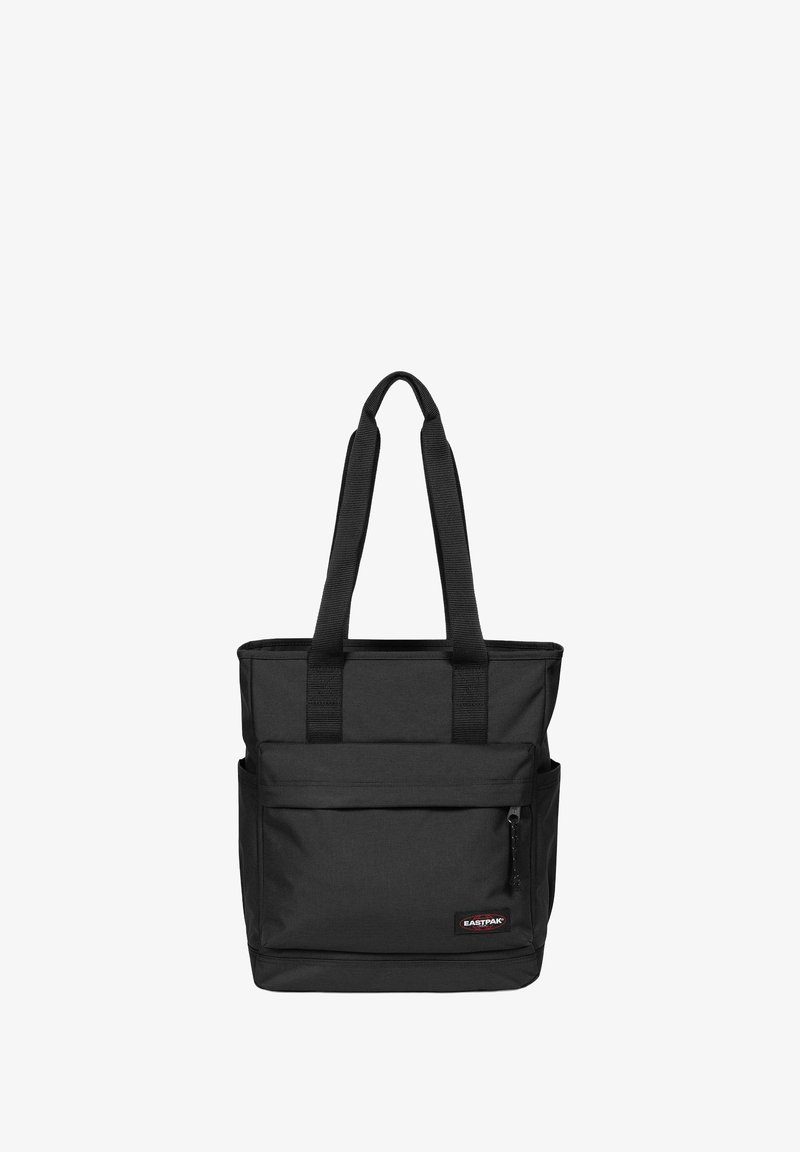 Sac cabas Eastpak noir avec deux longues anses et une poche avant zippée sur fond blanc.