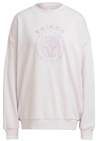 Ljusrosa sweatshirt med rund halsringning, sänkta axlar och en frontgrafik med tennisrack och lagerkrans. Mjuk tygtextur.