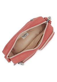 Rectangular coral zippered bag with a fabric exterior. Smooth lining, dual zippered compartments, and a label inside reading "Kipling Live Light."