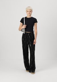 Pieces PCROXY   - Trousers - black
