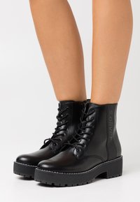 s.Oliver Platform ankle boots - black