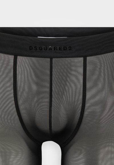 Boxer-briefs en maille noire avec une ceinture élastique de marque. Présente un panneau avant sans coutures et des détails de surpiqûre contrastants.