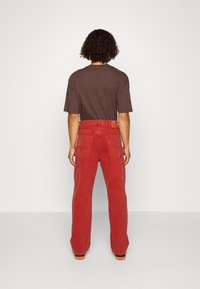 Levi's® Workwear 568™ LOOSE STRAIGHT CARPENTER - Ohlapne kavbojke - burnt henna